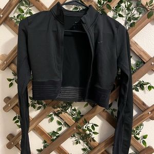 Xs black cropped right fitted Nike jacket! Only worn once!
